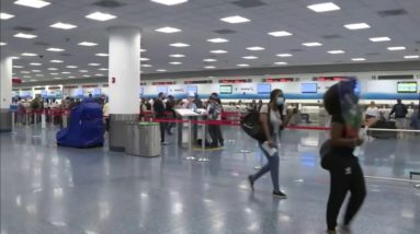 Frustrated passengers at Miami International Airport due to American Airlines cancellations